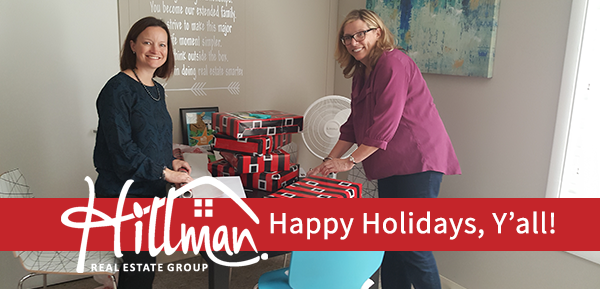 Hillman Real Estate Group team members get into the holiday spirit preparing Angel Tree gifts